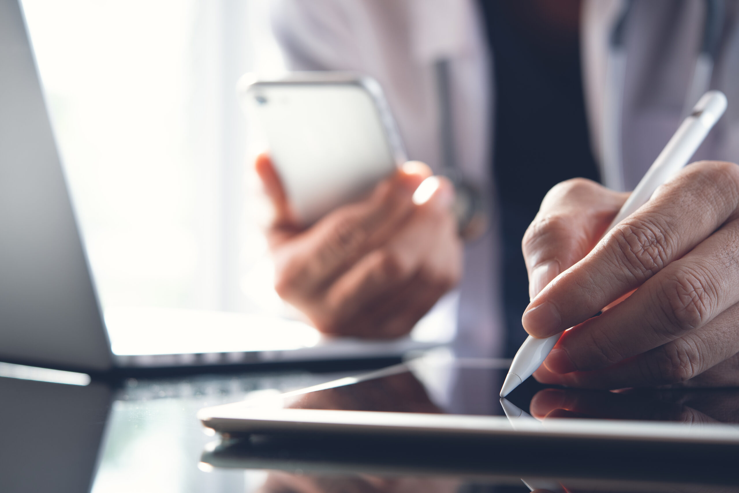 Doctor working on laptop computer